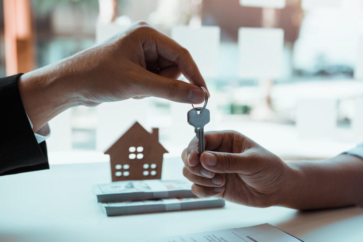 New home buyers are signing a home purchase contract at the agen